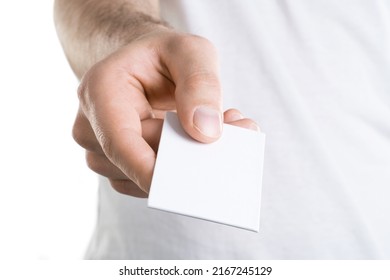 Mockup Of Man's Hand Holding A Bussines Card, Isolated On White Background