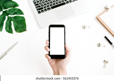 Mockup Of Mobile Phone With Blank Screen In Female Hand. Flat Lay, Top View Workspace