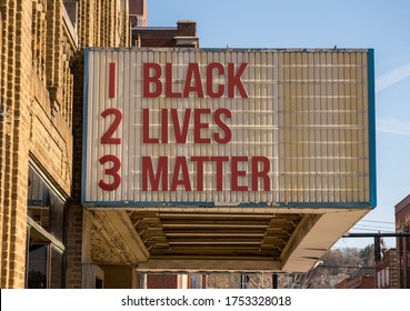 Mockup Of Movie Cinema Billboard With Message Of Black Lives Matter On The Marquee Sign In Downtown Street