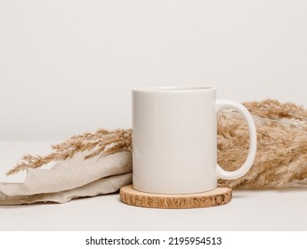 Mockup Mug With Linen Cloth And Dry Pampas Grass At The Background. Mug For Logo, Text Or Design, Minimal Boho Style