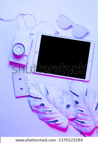 Mockup on tablet on mint background with pink leaf, cassette and doughnut