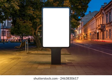 Mockup Of An Outdoor Poster Billboard On Street At Night. Blank Advertising Display With Car Light Trails In The Background - Powered by Shutterstock