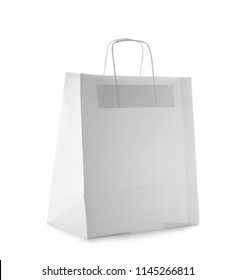 Mockup of paper shopping bag on white background - Shutterstock ID 1145266811