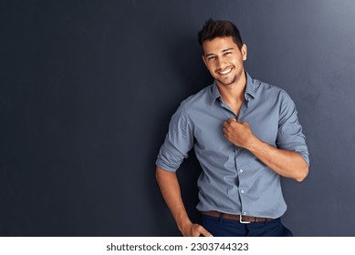 Mockup, portrait and happy business man in studio confident, young and empowered against black background. Face, smile and cheerful male person with positive attitude posing on isolated copy space - Shutterstock ID 2303744323