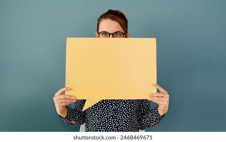 Mockup, portrait and speech bubble with business woman in studio on blue background for information. Advertising, announcement or marketing and employee with space on poster for news or social media - Powered by Shutterstock