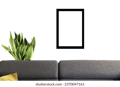a mockup of a sofa in a living room with a plant in the background with a vertical frame for photo in black - Shutterstock ID 2370047161