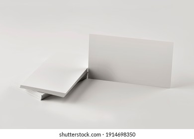 Mockup Of A Stack Of Blank Business Cards On A Gray Table Close Up.