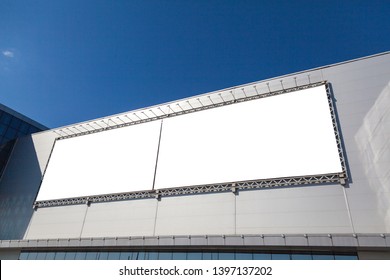 Mockup Of Street Billboard On The Facade Of The Exhibition Complex, A Huge Banner Ad, Large Format