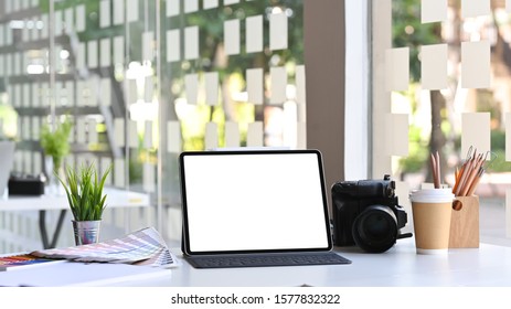 Mockup tablet on Creative workspace.