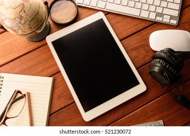 Mockup Tablet Similar To Ipad Style On Wood Desk. Black Display.keyboard And Office Stuff, Workplace, Top View