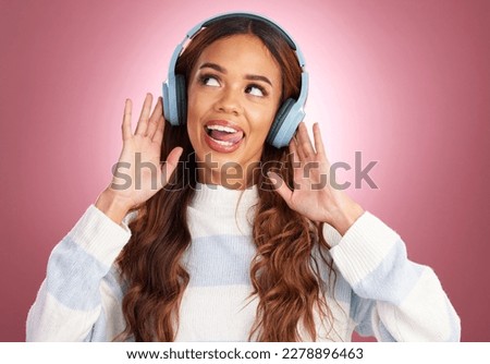 Mockup, tongue out and woman with headphones, streaming music and happy against a pink studio background. Headset, female and lady with joy, silly and listening to radio with audio, song and sounds