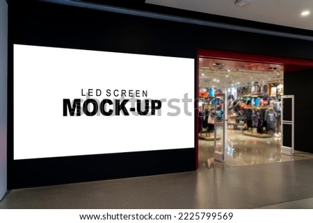 Mockup two large horizontal advertising LED Screen Install near entrance of shop, empty space for insert your graphic, announcement, multi-media content and advertisement in shopping mall