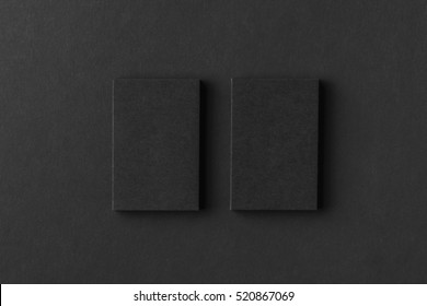 Mockup Of Two Vertical Business Cards At Black Textured Paper Background.