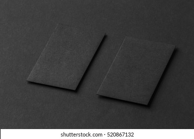 Mockup Of Two Vertical Business Cards At Black Textured Paper Background.