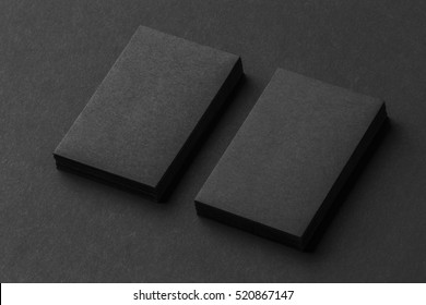 Mockup Of Two Vertical Business Cards Stacks At Black Textured Paper Background.