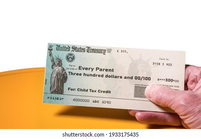 Mockup of US Treasury illustrative check for child tax credit for a single dependent to illustrate American Rescue Plan Act of 2021 payments - Shutterstock ID 1933175435