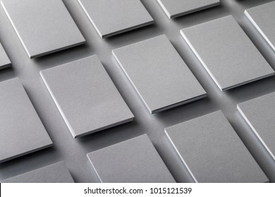 Mockup Of Vertical Business Cards Stacks Arranged In Rows At Grey Textured Paper Background.