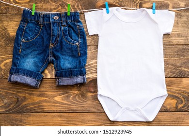 Mockup Of White Baby Bodysuit Shirt And Jeans