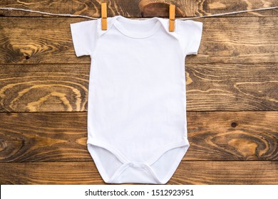 Mockup Of White Baby Bodysuit Shirt