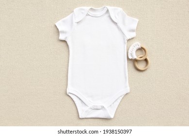 Mockup Of White Baby Bodysuit Shirt , Wooden Toy