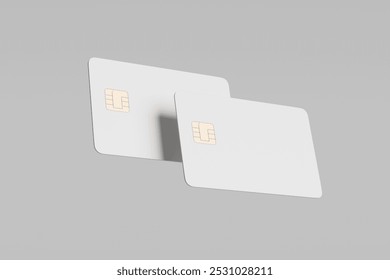 Mockup of white blank bank cards with chip on gray background. Template for design