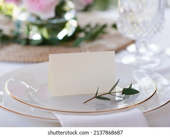 Mockup white blank space card, for Name place, Folded, greeting, invitation on wedding table setting background. with clipping path - Shutterstock ID 2137868687