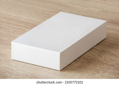 Mockup White Box On Wood Table Background