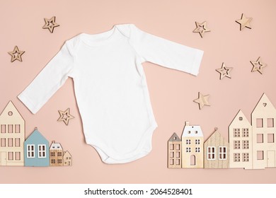 Mockup Of White Infant Bodysuit Made Of Organic Cotton With Eco Friendly Baby Toys. Onesie Template For Brand, Logo, Advertising. Flat Lay, Top View