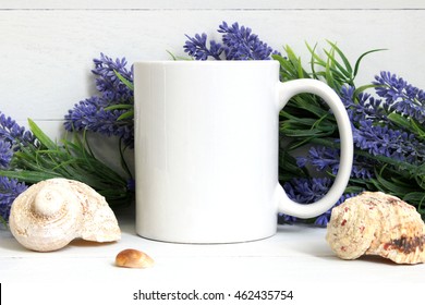 Mock-up of a white mug with lavender and seashells.