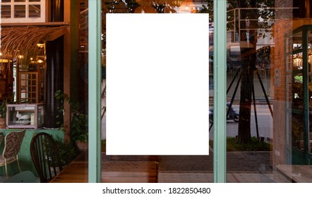 Mockup white paper or white promotion poster displayed on the front of the restaurant, coffee shop Promotion information for marketing announcements and details