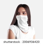 Mockup of white textured buff on a young girl with dark hair, half mask covering, protecting her face, isolated on background. Scarf template, for design presentation, print, for product advertising