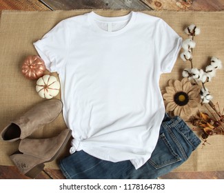 Mockup of a White T-Shirt Blank Shirt Template Photo with Fall accessories and burlap background