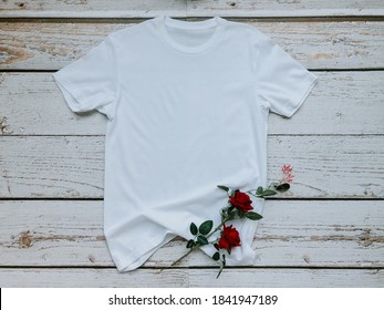 Mockup White Unisex T Shirt With Rose On Wood Background Flat Lay