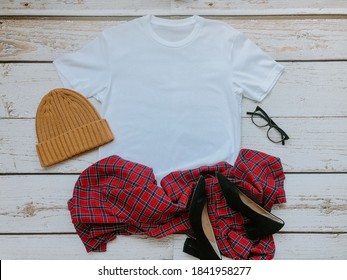 Mockup White Unisex T Shirt With Shirt, High Heels And Wool Hat On Wood Background Flat Lay