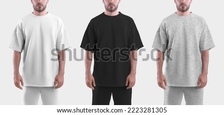 Mockup of a whitev, black and heather oversize t-shirt on a man. Clothes template isolated on white background.