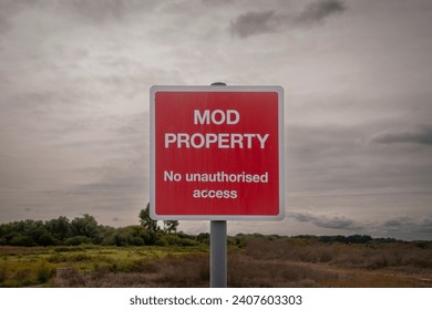 MOD Property, No unauthorised access sign in the countryside.
