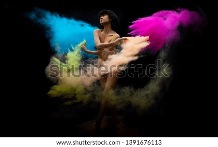 model asian girl emotion posing and movement with dust color on dark background is at work  creative concept