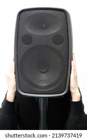 Model behind a baffle imitating a wise monkey