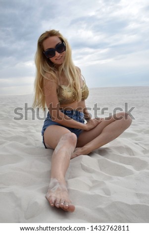 Similar – Young, slim, blonde woman on a Baltic beach