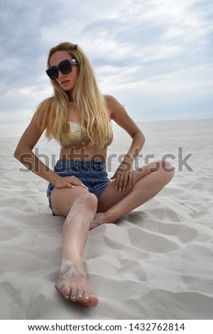 Similar – Junge Frau vor Stranddüne