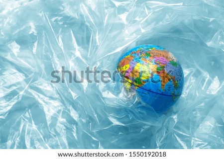 Similar – #A# World in the garbage