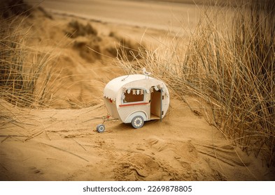 Model Camper Caravan On Sandy Beach - Shutterstock ID 2269878805