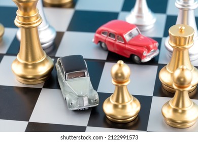 A Model Of A Car Among Chess Pieces