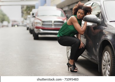 Model Checking Her Makeup In The Car Mirror