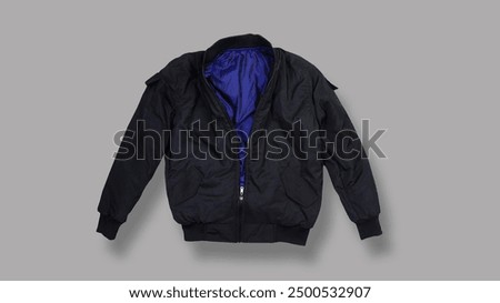 model and design of the front view of a black bomber jacket on a gray background
