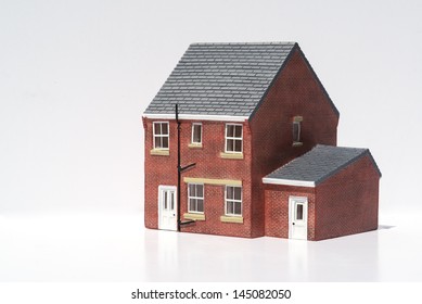 Model Of Detached House On White Background