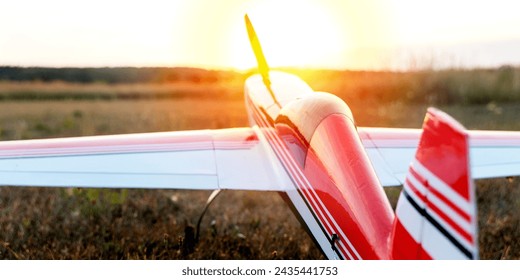 model of an electrically controlled airplane at sunset in