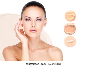 Model face of beautiful woman with foundation on skin make-up cosmetics .  