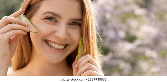 Model girl with aloe vera leaf, wellness and skincare concept. Young woman with pieces of aloe vera plant, close-up portrait. Woman beauty, face care cosmetic concept. Selective focus - Powered by Shutterstock