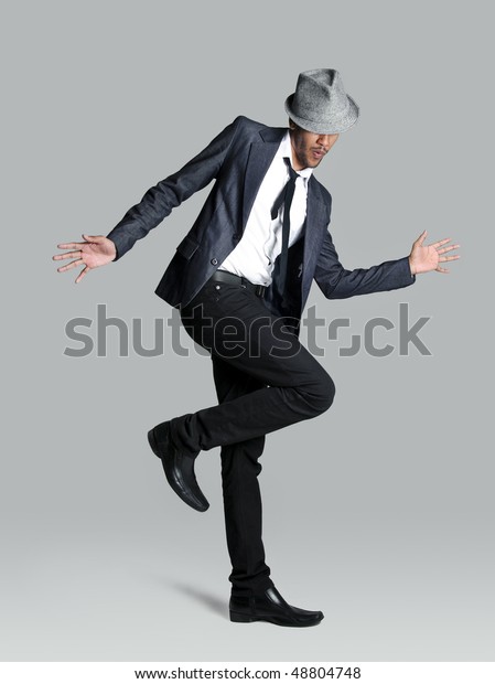 Model is\
happy and lets it show with his jazz\
hands